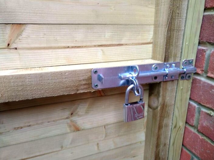 Attaching bolt lock to gate