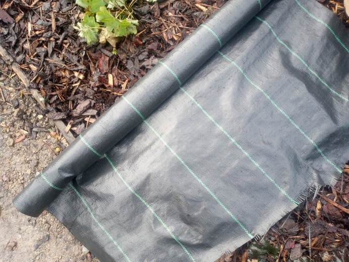 Weed proof membrane and bark