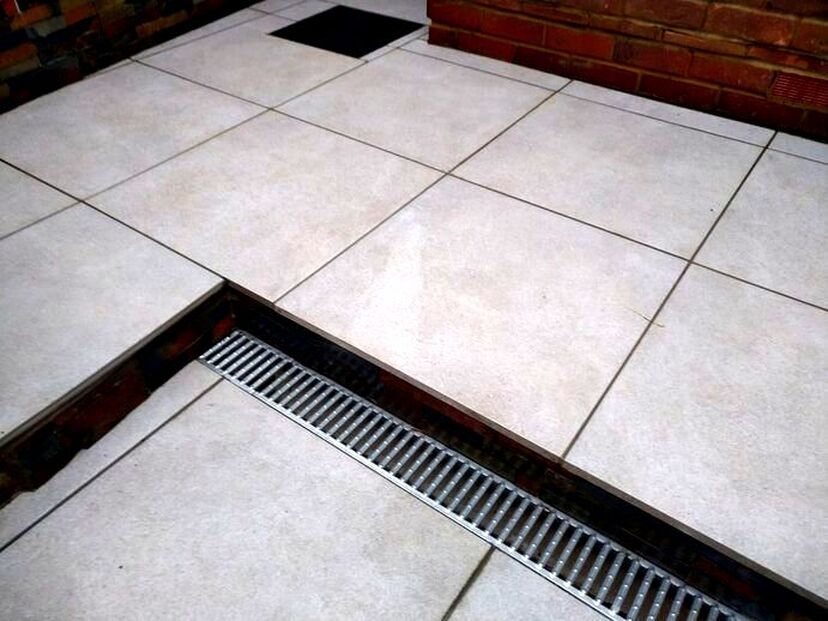 Porcelain paving with drainage grill