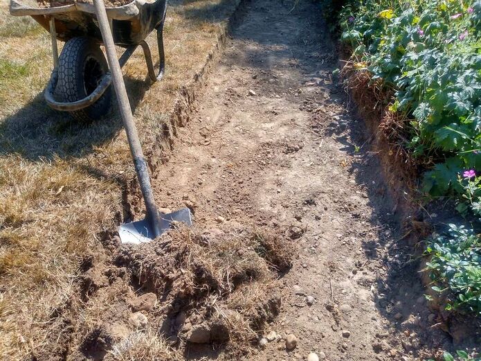 Excavating soil for basing gravel