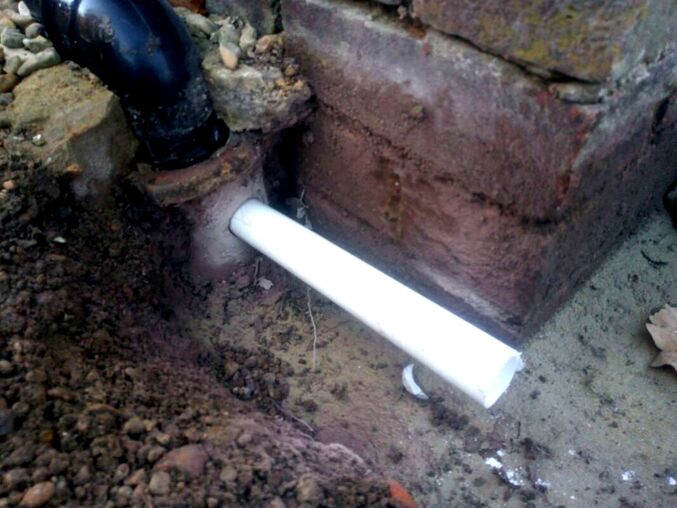 Fitting a pvc pipe to a clay pipe